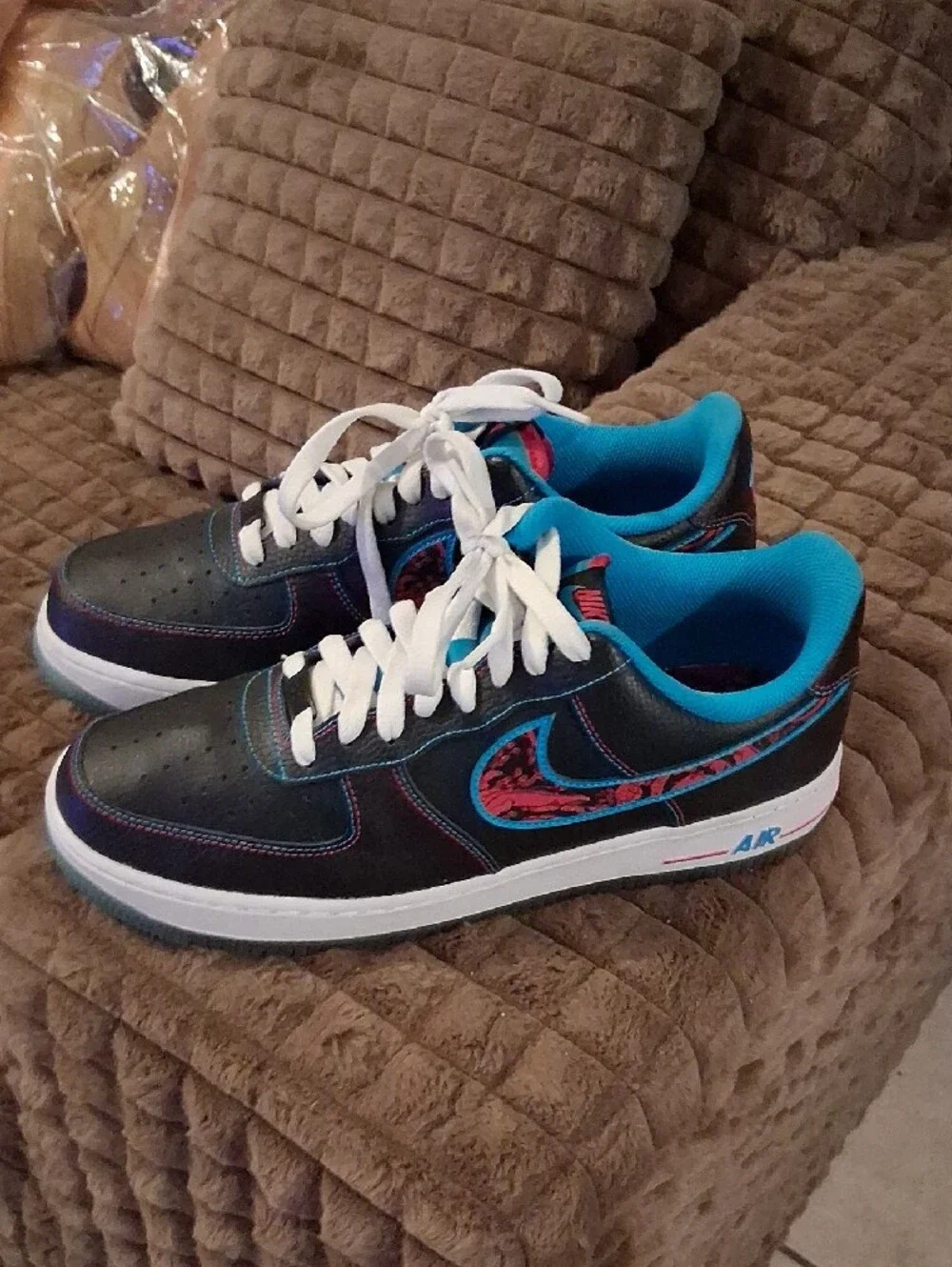 Nike Black Sneakers with Blue Lining and Red Patterned Swoosh